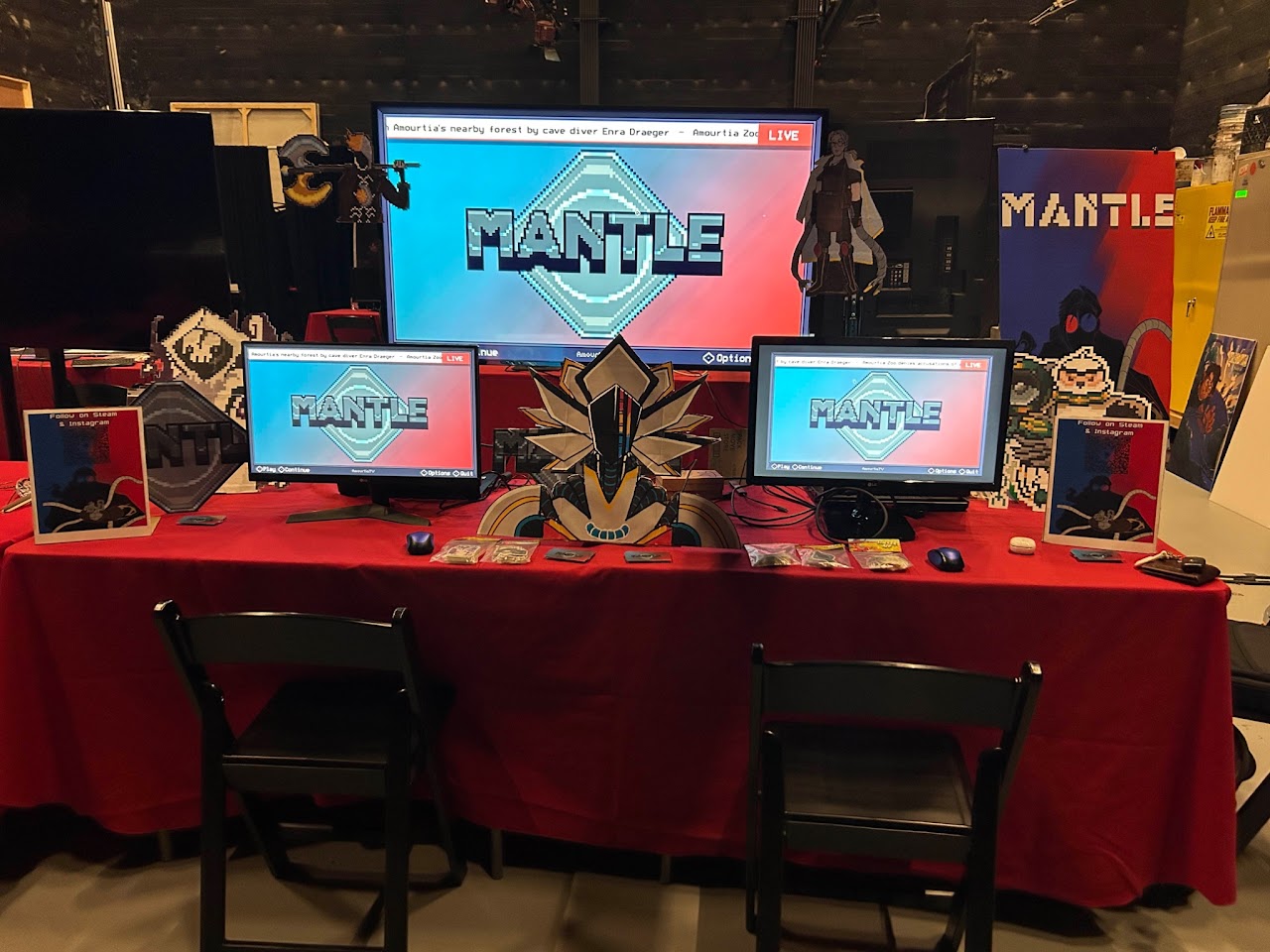 Mantle team booth at USC Games Expo with players trying the demo